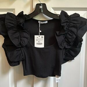 Never worn. Tags still on. Black Zara shirt